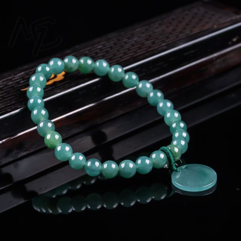 سوار محبوك يدويًا من خرز اليشم - مراجعة Charm Bracelet Beads وسعره